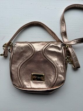 Betsey Johnson Metallic Rosegold Crossbody Bag with Gold Plaque approx 6” x 6”